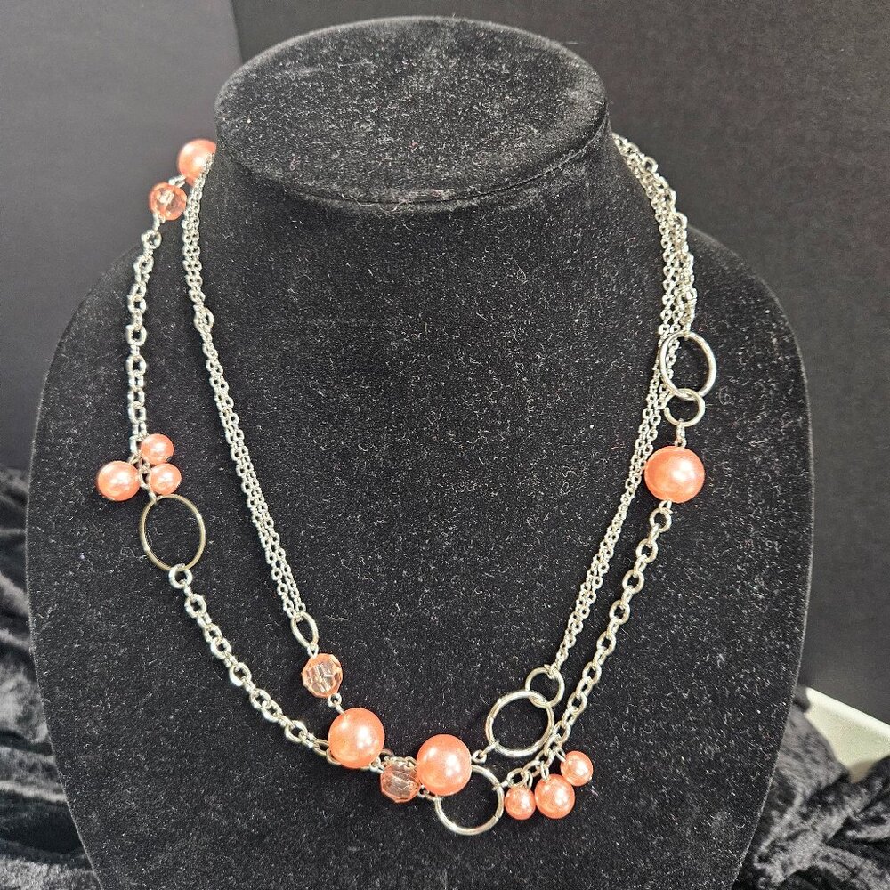 Long Silver toned necklace with clear pink beads / circle accents
